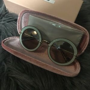 Sunglasses (Miu Miu)